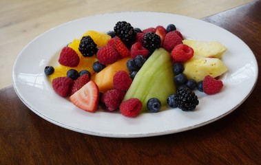 Healthy fruit plate with melons and berries