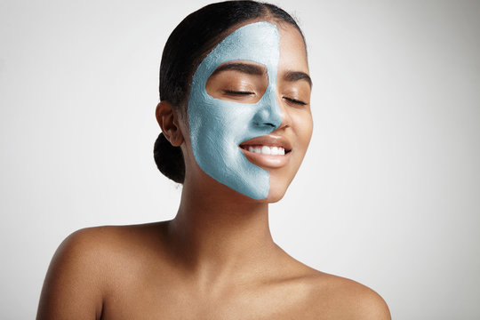 Smiling Woman With Closed Eyes And A Half A Face With A Mask