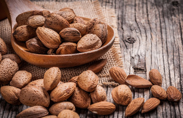 Almond nuts in mixing scoop 