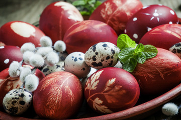 Easter eggs with a pattern, fluffy pussy willow twigs, the leave