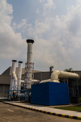 Obraz premium Smoke stack of the industrial plant