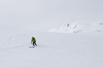 Fototapeta na wymiar skier going fast while turning