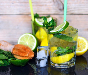 Lemonade. Summer soft drink of lemon, lime and mint with ice