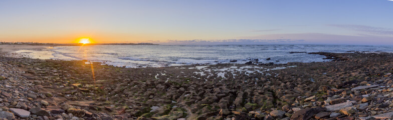 Fototapeta na wymiar Panoramic Sunset Atlantic Ocean view at Dar Bouazza beach