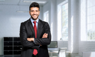 Fototapeta premium Smiling manager in his office