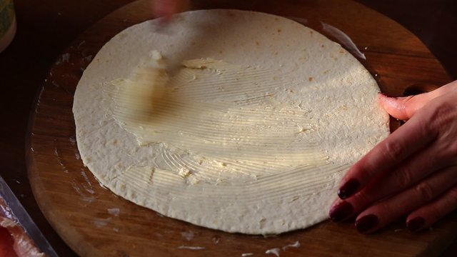 Cooking Mexican tortilla with salmon. The first part