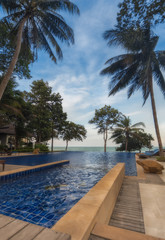 Thailand. Ko Chang. Chang Buri Resort hotel swimming pool with sea views.