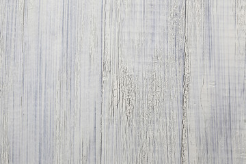 Obraz premium Painted white old cracked wooden background