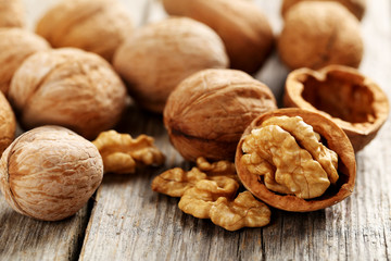 Walnuts on a grey wooden table