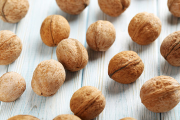Walnuts on a blue wooden table