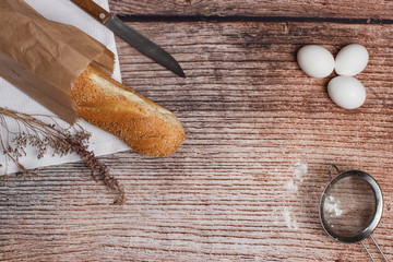 Fresh bread on a wooden surface