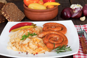 German bratwurst sausages with sauerkraut