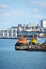 Tugboat and port cargo crane