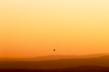 Balloon at sunset