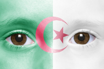 human's face with algerian flag