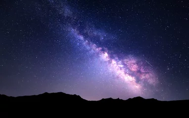 Foto auf Glas Landscape with Milky Way. Night sky with stars at mountains © den-belitsky