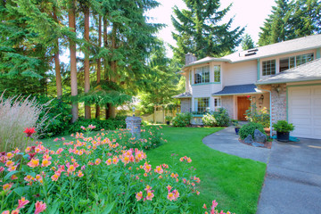 Beautiful yard filled with greenery and flowers.