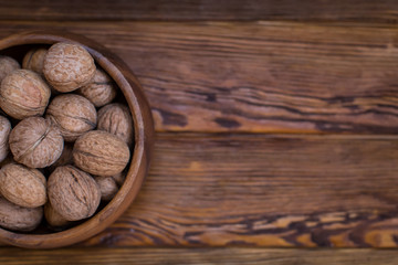 nuts on a wooden background