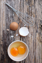 Eggs in a bowl with whisk