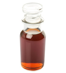 Maple vinegar in glass vial over white background