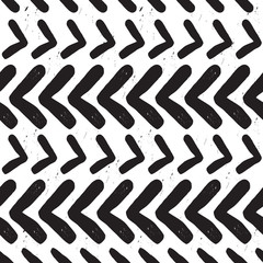 Modern and trendy abstract black hand drawn chevron texture pattern on white background