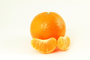 Ripe mandarin  tangerine orange  closeup on a white background