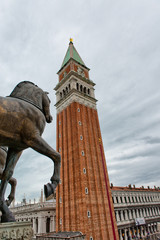 Fototapeta na wymiar View of the Campanile in Venice against grey sky