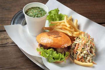 the composition of the lunch kit with burgers, soup and salad