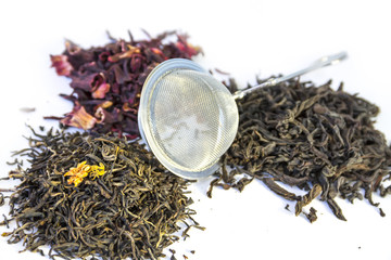 Three kinds of tea - red, green and black mesh and brewing