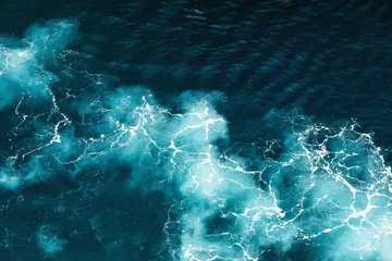 Rolgordijnen Oceaan golf Abstracte plons turkoois zeewater