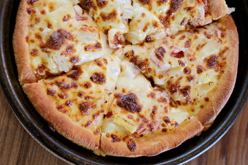 traditional of hot cheese pizza on pan.