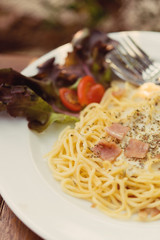 The spaghetti white sauce with bacon.