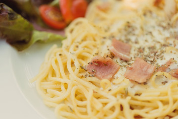The spaghetti white sauce with bacon.