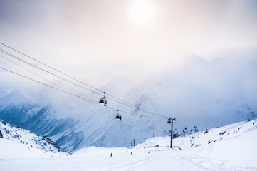 Fototapeta na wymiar Ski slope and cable car on the ski resort Elbrus