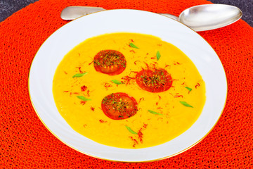 Pumpkin Soup with Carrot and Cherry Tomatoes, Saffron, Dried Her