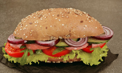 Retro food: Fresh sandwich with lettuce, tomato and onion.