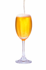 Pour beer into a glass with a white backdrop.