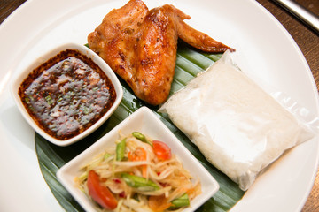  Green papaya salad, grilled chicken and sticky rice