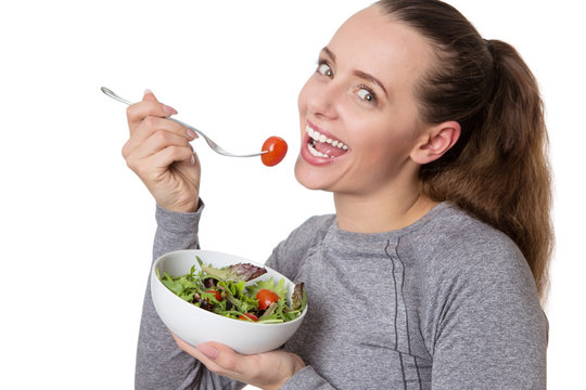 fitness woman eating salad