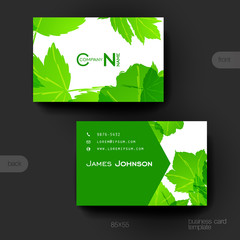 Business card vector template with autumn leaf ornament background
