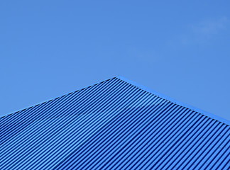 Fototapeta na wymiar Blue roof metal sheets