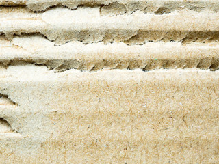 close up scratch  brown corrugated cardboard, abstract backgroun