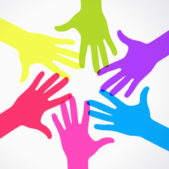 Conceptual circle of colorful hand prints