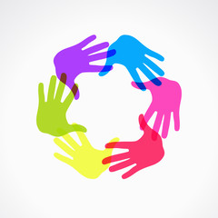 Conceptual circle of colorful hand prints