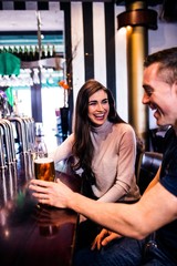 Cute couple having a drink