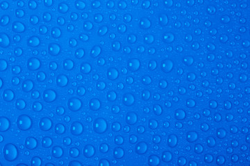 Blue water drops background