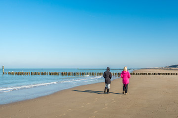 Women walking on the beach