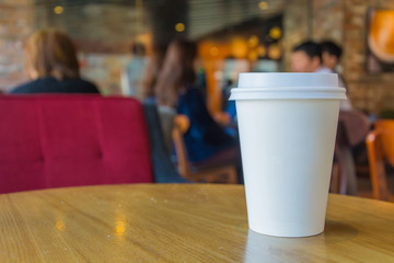 White coffee cup in coffee shop