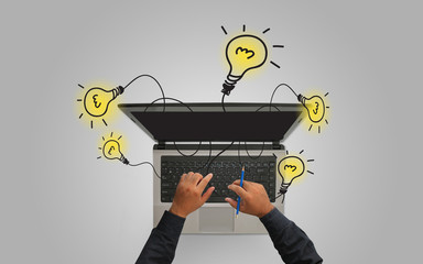 Businessman using laptop.Creative idea concept. © fgnopporn
