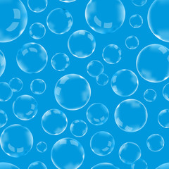 Many of soap bubbles on blue, seamless pattern